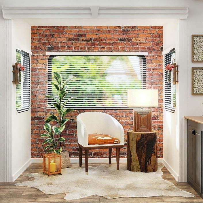 Inviting lounge area with exposed brick design and single chair, featured in home buyers agent Brisbane marketing campaigns.